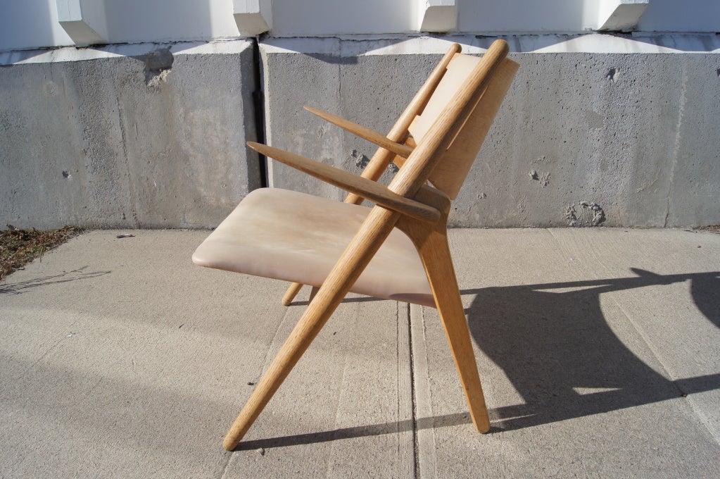 Mid-20th Century Leather CH-28 Sawback Easy Chair by Hans Wegner for Carl Hansen & Son