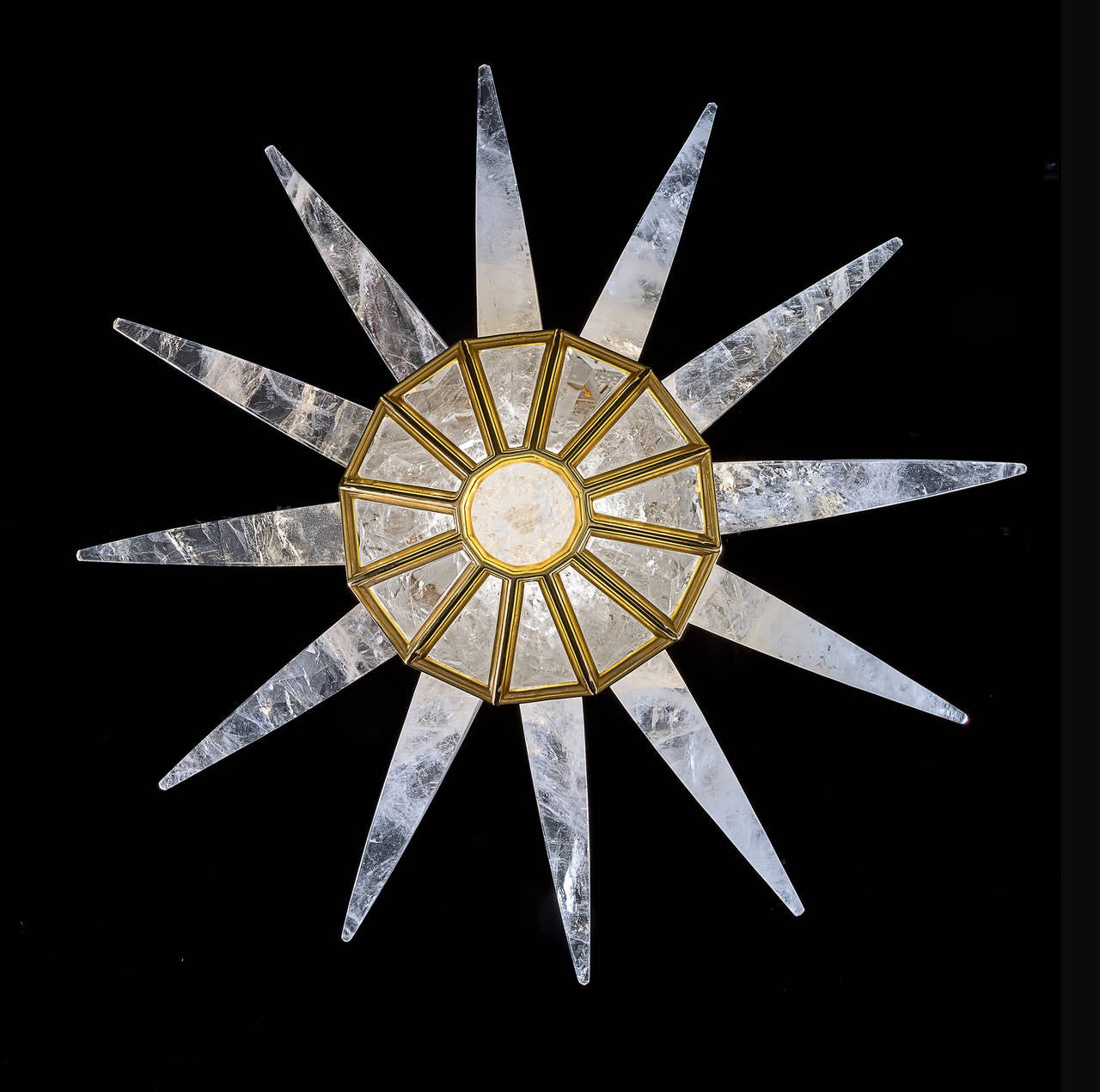 A museum quality, handmade rock crystal light fixture. Each prism is square cut from a single block of personally selected rock crystal. 

Available finishes: Silver, Antique Brass, Gold, Black Nickel, Cannon Grey & Palladium
[palladium is a