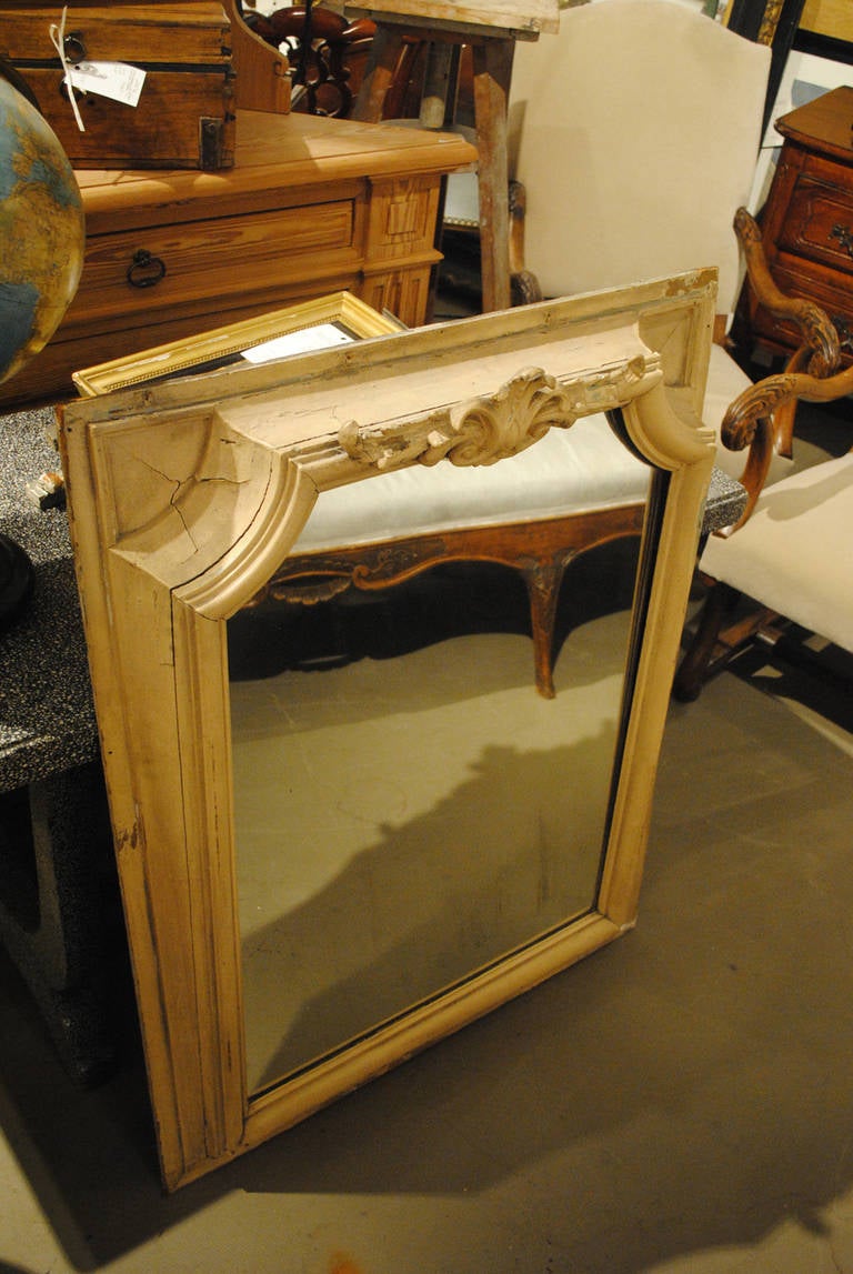 19th century French oak painted mirror with crest.