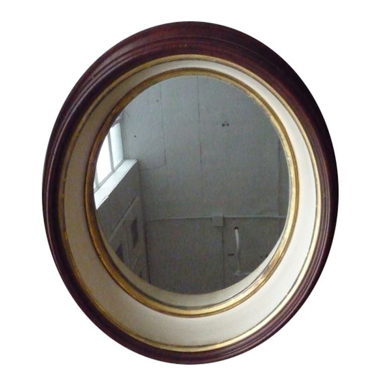 Oval walnut mirror