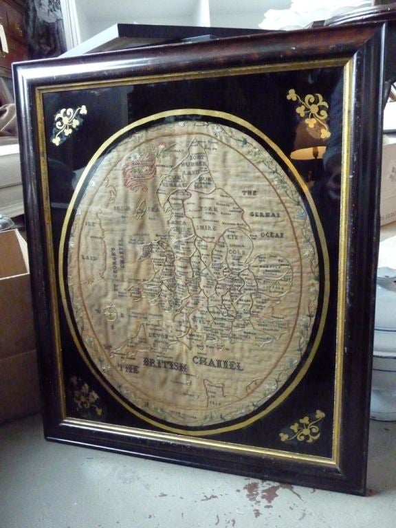 A rare and early sampler map of England and Wales dated and signed Sarah Goulden 1816.