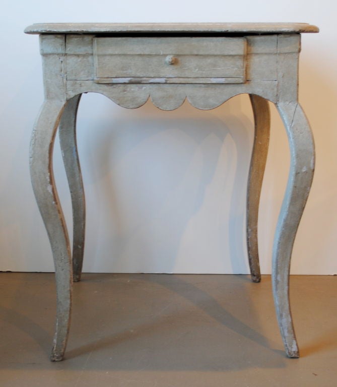 Grey painted table with cabriole legs, scalloped detail and original paint.