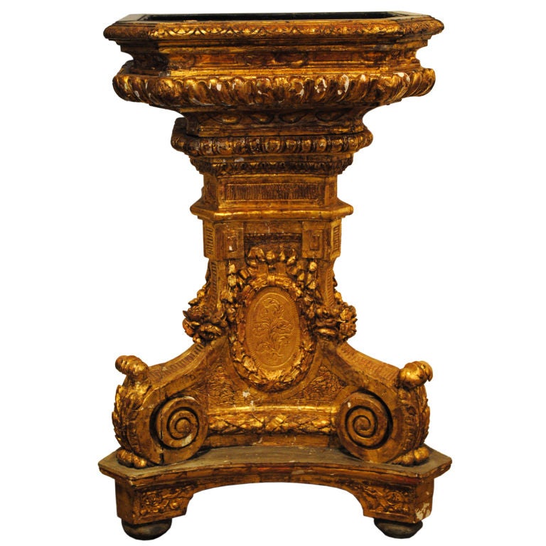An important and rare highly decorated paint and giltwood jardiniere. Tole insert and highly carved detailing.