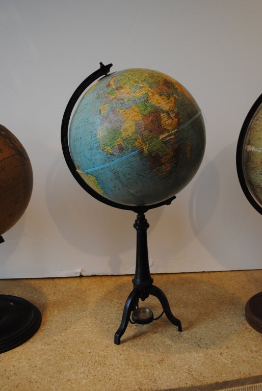 Paper Around the World in Ten Globes For Sale