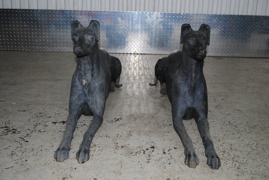 A wonderful pair of cast iron whippets retaining their original surface.