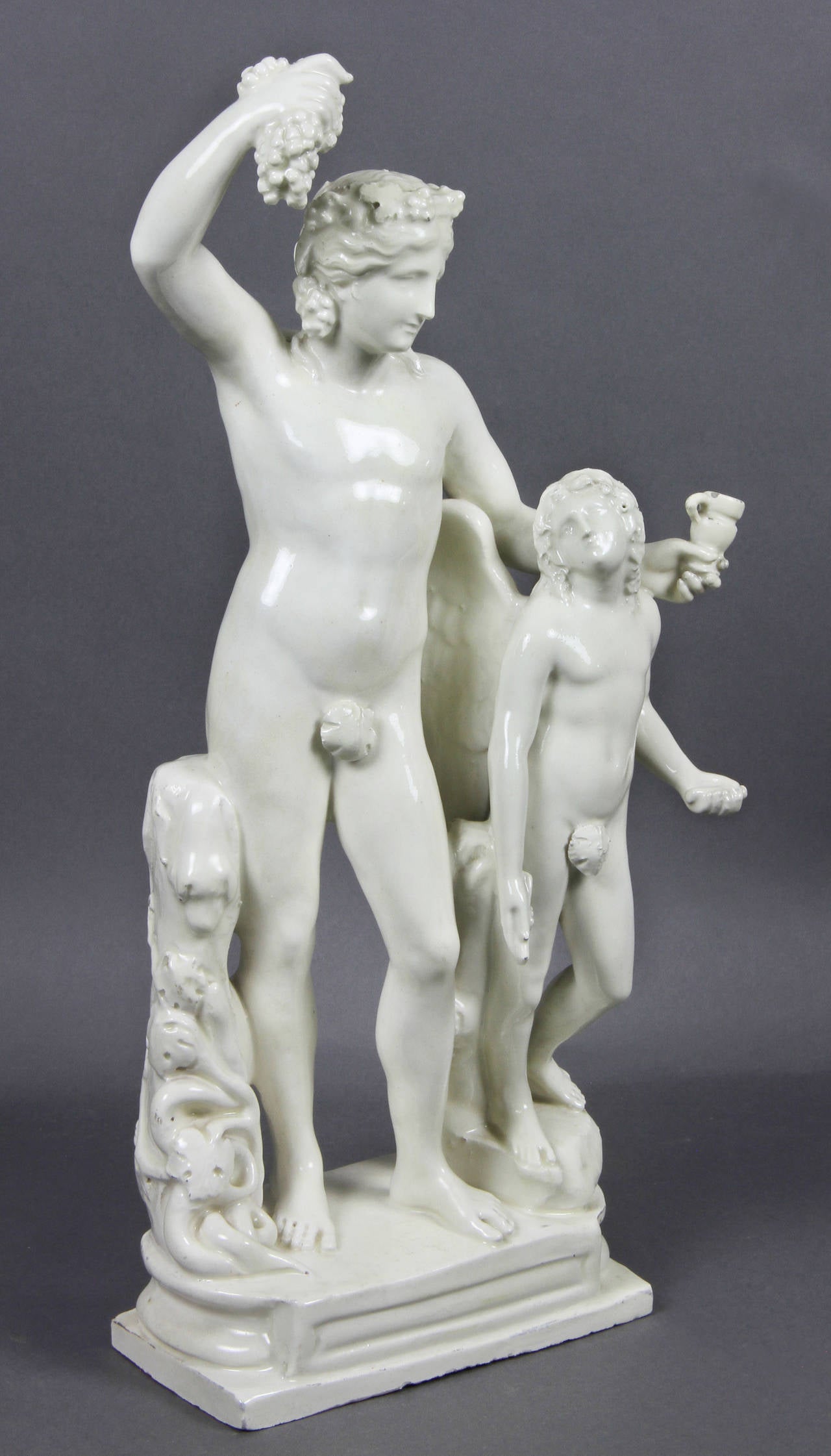 Creamware Figure of Bacchus with a Winged Boy In Good Condition In Essex, MA