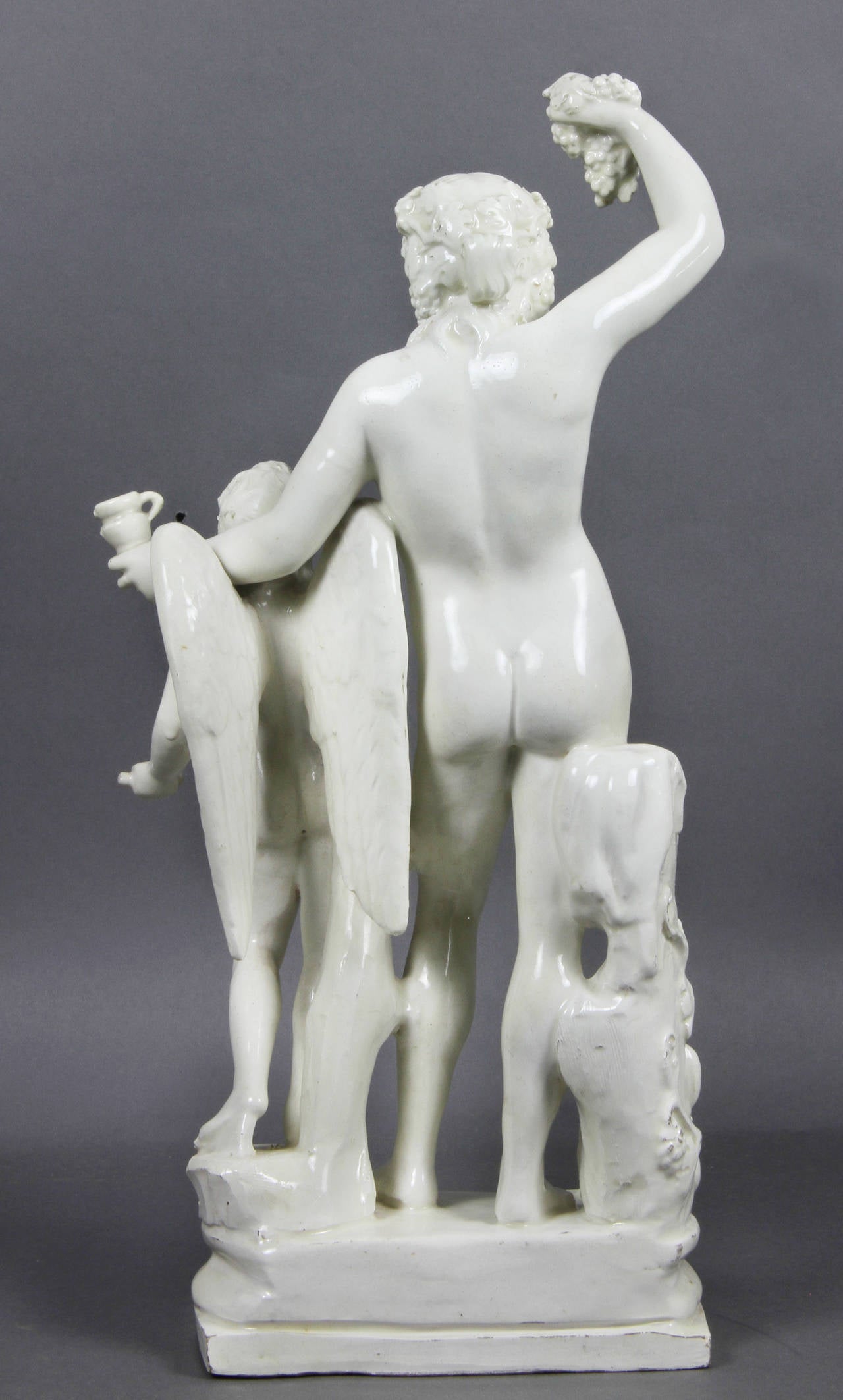 Creamware Figure of Bacchus with a Winged Boy 1