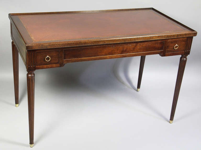 RECTANGULAR LIFT OFF TOP, WITH REVERSIBLE BROWN LEATHER AND GREEN BAIZE OPENING TO A BACKGAMMON SURFACE WITH IVORY INSERTS , FRIEZE WITH OPPOSING CHIP DRAWERS , CIRCULAR TAPERED FLUTED LEGS , BRASS SABOT