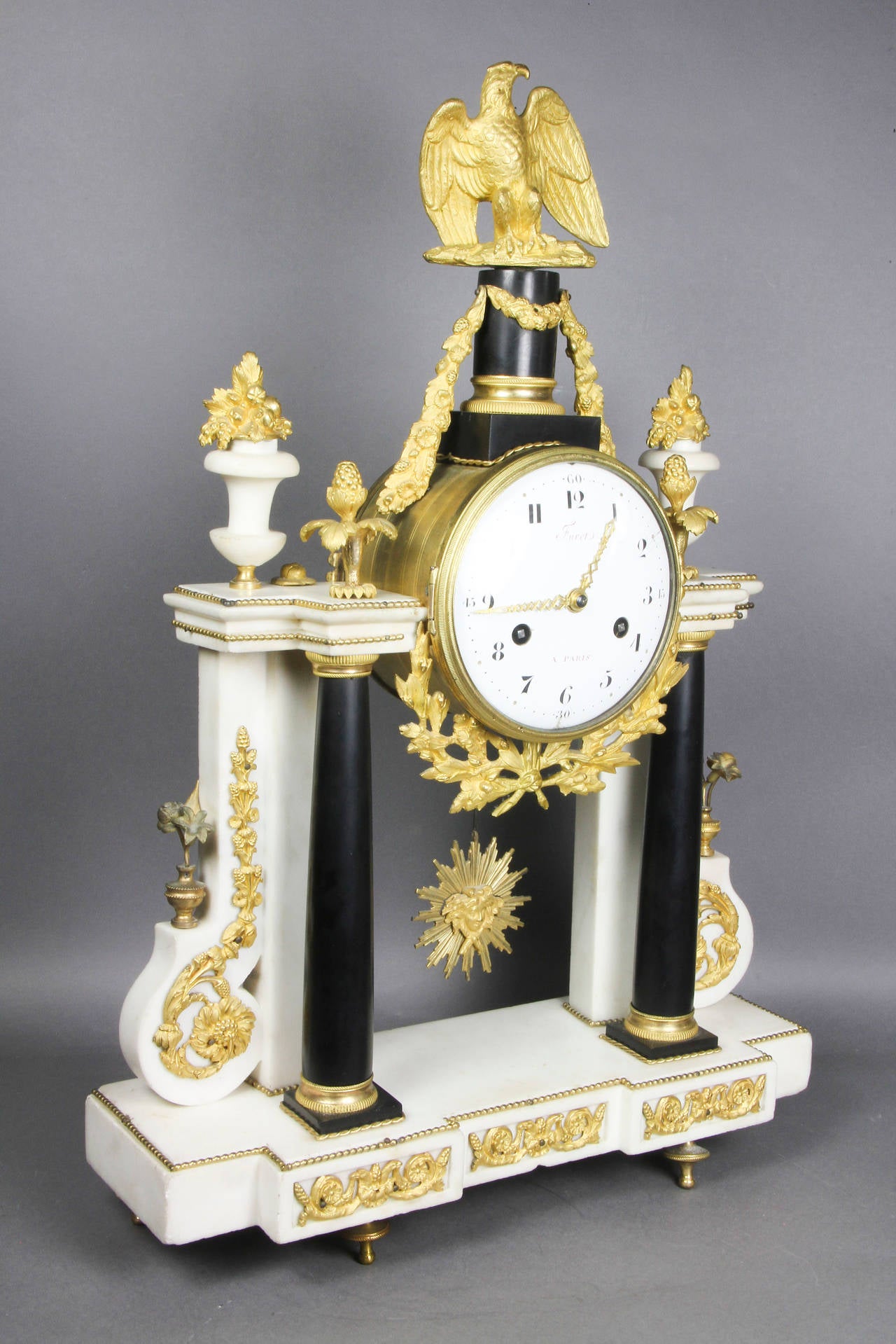 Late Louis XVI Ormolu-Mounted Black and White Marble Mantle Clock by Furet 1