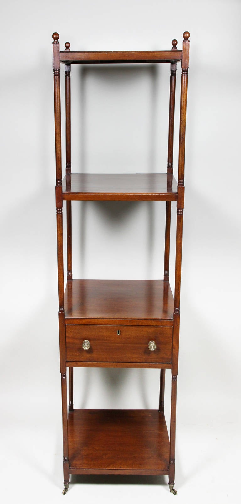 Square with four shelves and a drawer , casters