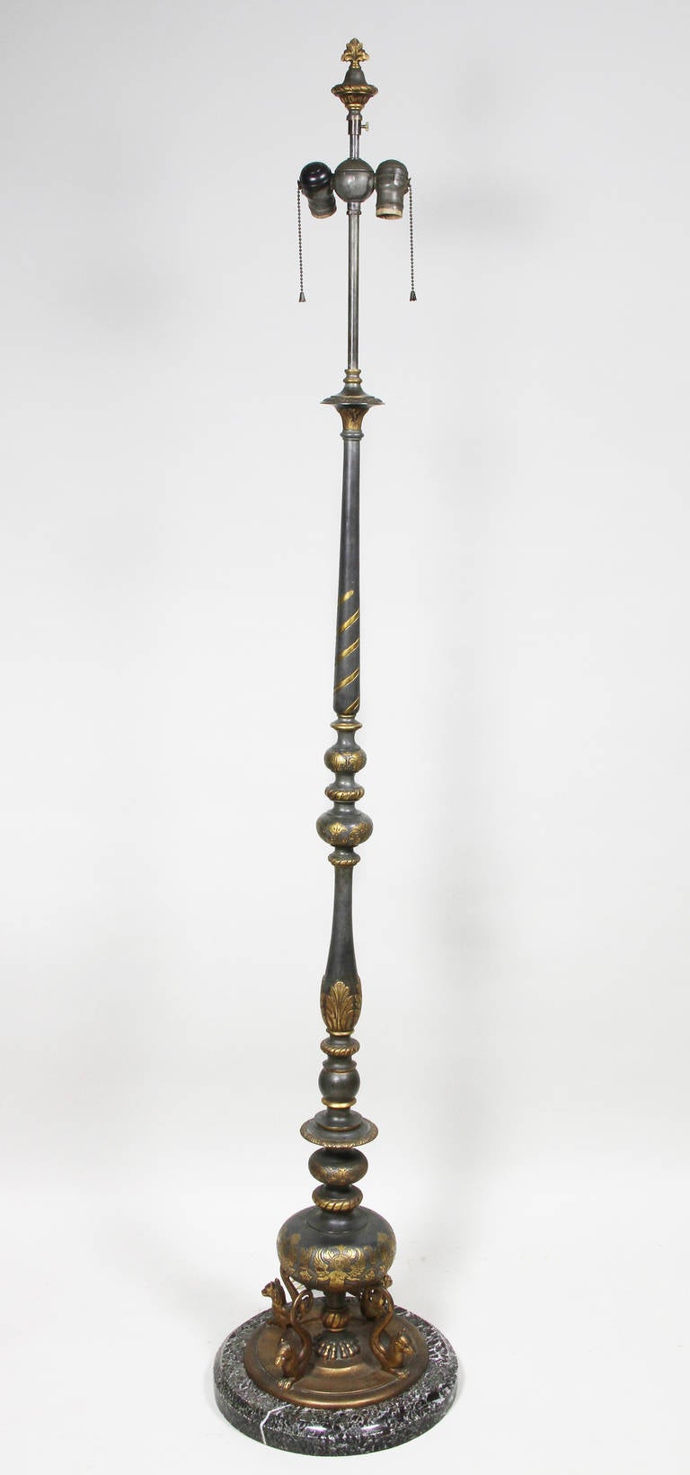 Attributed to Caldwell with pewter and gilt finish to decoration , turned support decorated with leaves and winged figures. Figural animal supports and marble base.