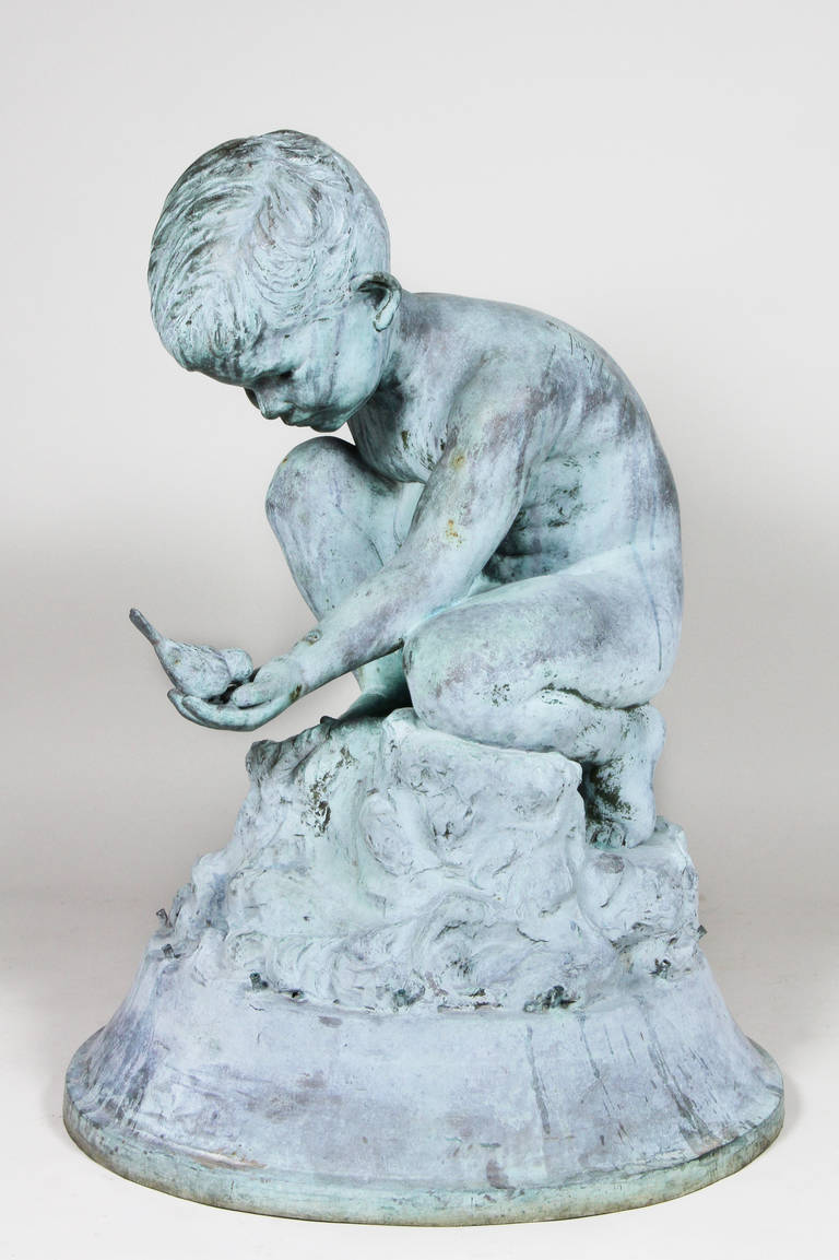 Depicting a boy holding a bird. Signed Bashka Paeff SC , and marked along base Roman Bronze Works Inc NY. Note ; Paeff immigrated to Boston as a child from Minsk , Russia and studied at the Museum Of Fine Arts. A version of this is in the Boston