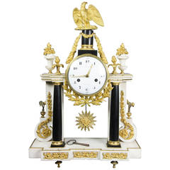 Late Louis XVI Ormolu-Mounted Black and White Marble Mantle Clock by Furet