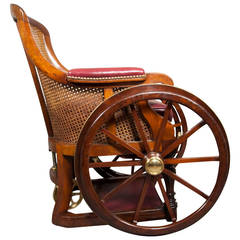 Unusual Regency Mahogany and Caned Wheel Chair Signed by Maker
