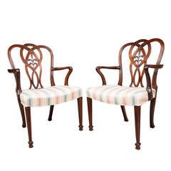 Set of 12 George III Style Mahogany Dining Chairs by Howard and Son, London