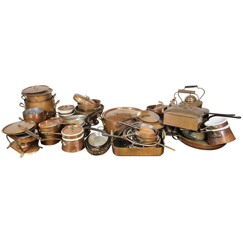 Approximately Thirty Five Copper Pots And Pans
