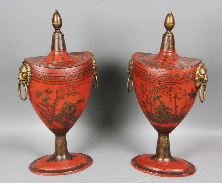 Each with gilded finial , oval form with loins head handles , oval bases. Provenance;  Kentshire Galleries