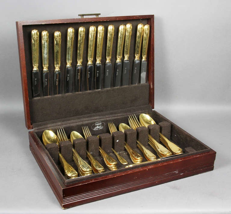 Each piece with monogram on the reverse.Comprising 8 tablespoons, 10 dinner forks , 6 spoons , 8 dessert forks , small ladle , 10 bread knives , 13 dinner knives. 88 toz excluding the knives.