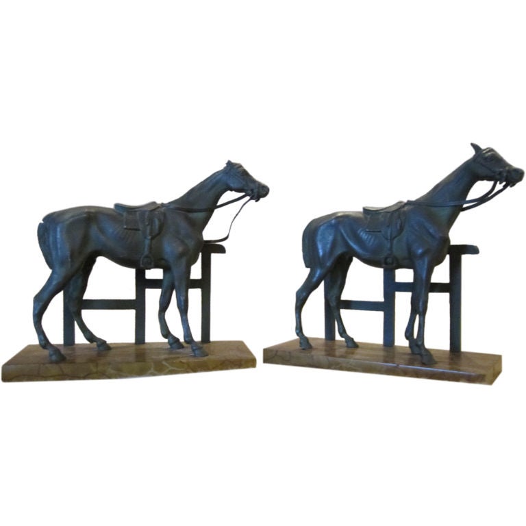 A pair of bronzed metal horse bookends