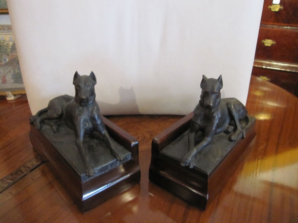 Pair of reclining great danes signed George Gardet, has foundry marks. Stamped on wood base Tiffany and Company.