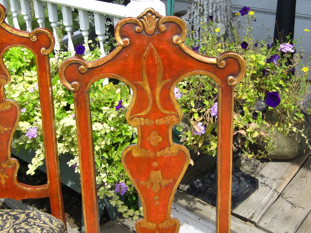 Set Of Eight Spanish Rococo Red Lacquered And Gilt Dining Chairs