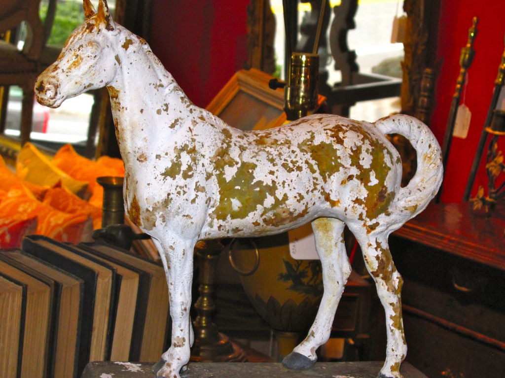 FIGURAL STANDING HORSE MOUNTED ON WIDE RECTANGULAR BASE