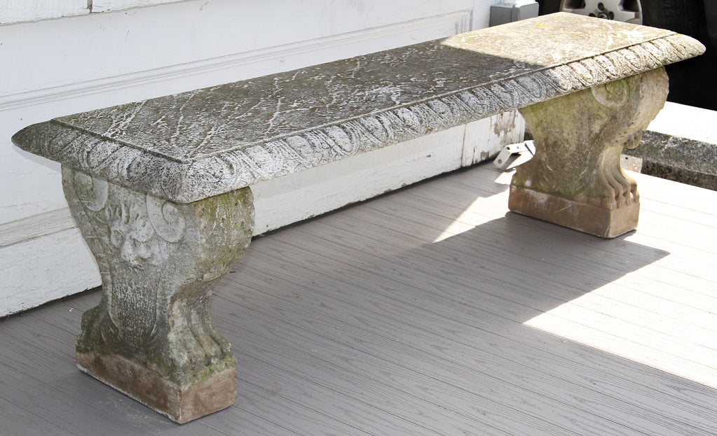 RECTANGULAR SEAT WITH EGG AND DART EDGE,SUPPORTED ON ACANTHUS CARVED SUPPORTS WITH LOINS HEAD CARVING, PAW FEET