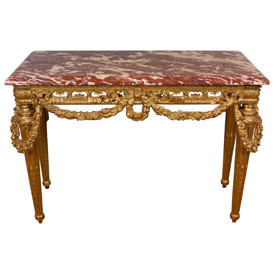 Table console française de style Louis XVI en bois doré avec guirlandes