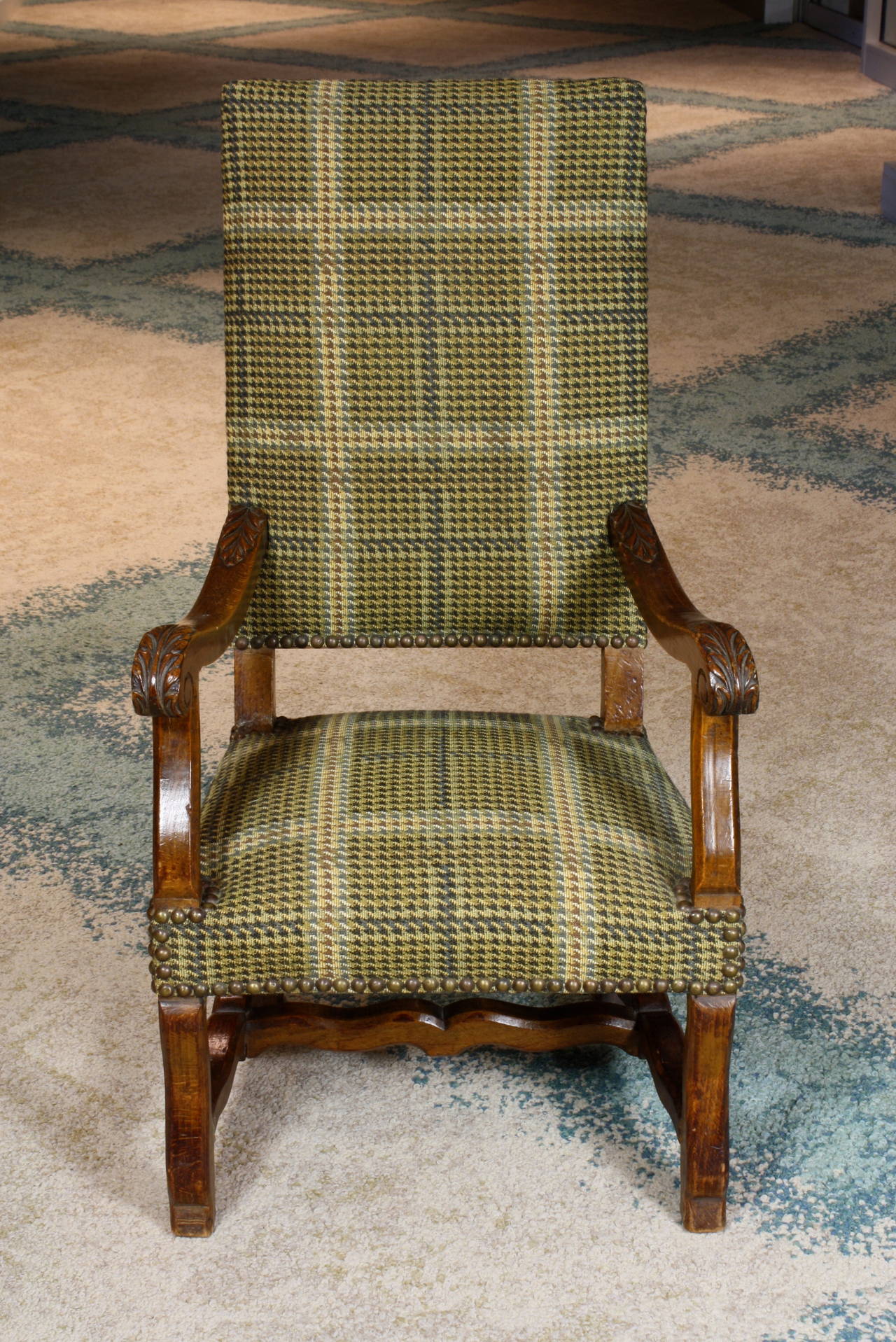 A high-quality, French child's armchair or fauteuil, in the Louis XIV style (Circa 1900), with Scottish tweed fabric upholstery (more recent), brass nail head trim and 