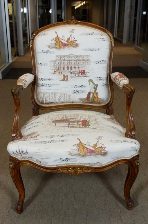 Hand-Carved Pair of French Louis XV Style Fauteuils with Mozart and Music Themed Toile For Sale