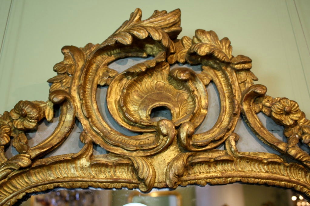 Mercury Glass Highly Carved French Rococo Trumeau Mirror from the Louis XV Period