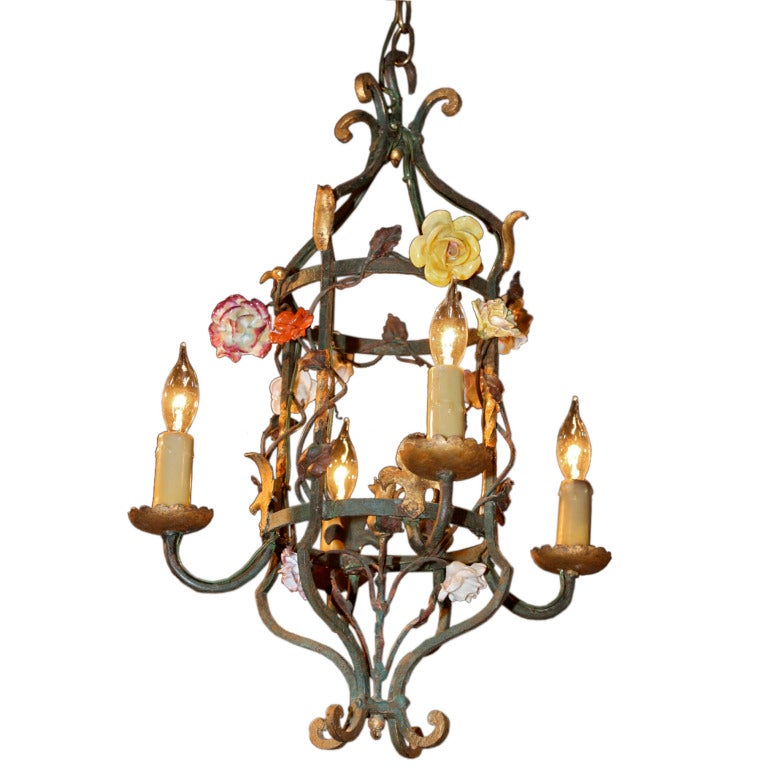 French Porcelain Roses And Tole With Huge Cherub Swinging Chandelier French Porcelain Roses And Tole With Huge Cherub Swinging Chandelier At 1stdibs