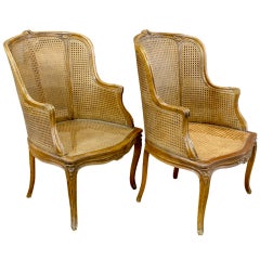 Antique Pair of French Caned Fruitwood Bergeres