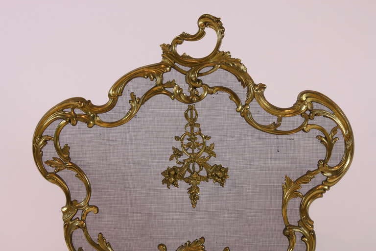 Doré Pare-étincelles en bronze doré de style Louis XV