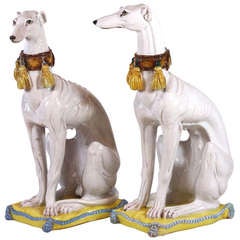 Pair of Italian Ceramic Greyhounds Seated on Cushions