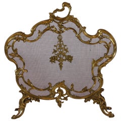 Pare-étincelles en bronze doré de style Louis XV