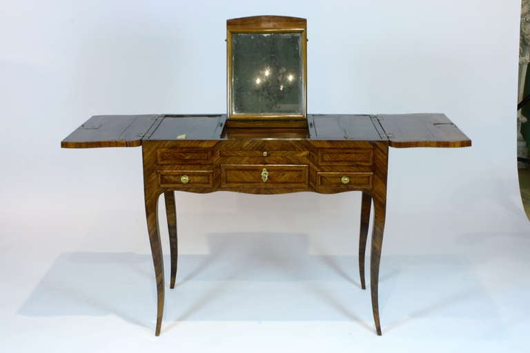 A lovely French parquetry ladies dressing table or 