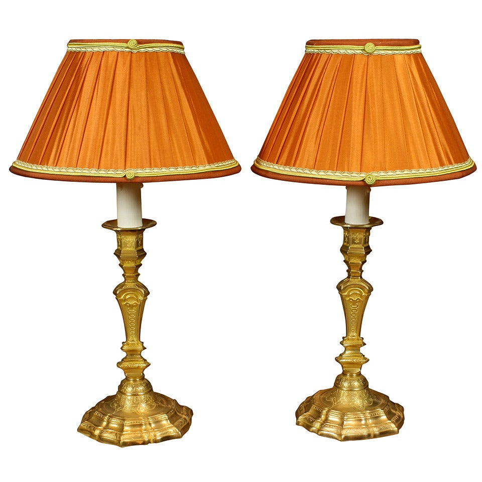 Pair of French Gilt Bronze Candlestick Lamps For Sale