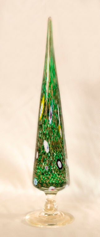 Vintage Murano christmas tree (rare).   Green and gold ovoid body with millefiore pattern resting on a clear round base with polished pontil.
