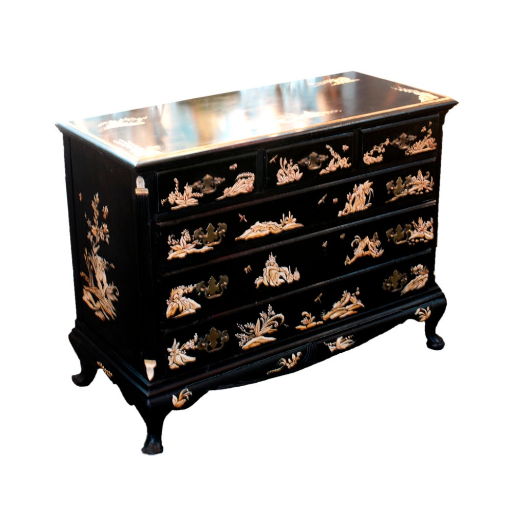 English Japanned chest of drawers with three small drawers over three long drawers.  The legs are of a cabriole style with pad feet.  The term 