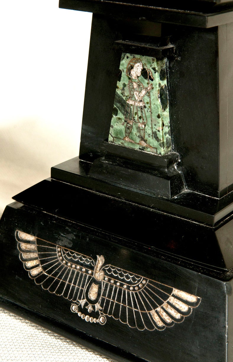 Pair of green marble obelisks with Belgian black marble bases.  Both top and bottom have deeply incised hieroglyphics in siver and gold detail.