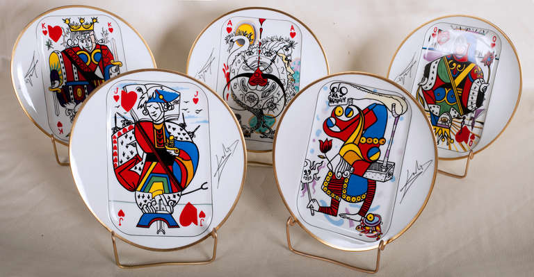 Set of five porcelain plates by Puiforcat designed and signed by Salvador Dali.
They were produced in 1967 as a set of five plates representing the Ace, King, Queen, Jack and Joker of hearts.  They are fully marked on the reverse and made in a