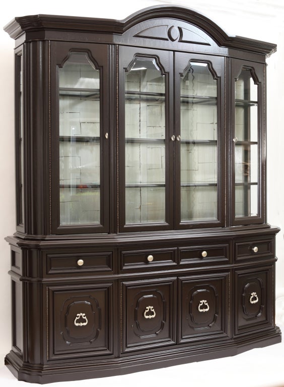 SALE: $2,550 (70% off)  / ORIGINAL $8,500
+ An impressive breakfront in the Hollywood Regency style
+ Comprised of two parts connected in the back by removable support
+ Newly refinished in semi-sheer espresso satin lacquer
+ Oak grain is
