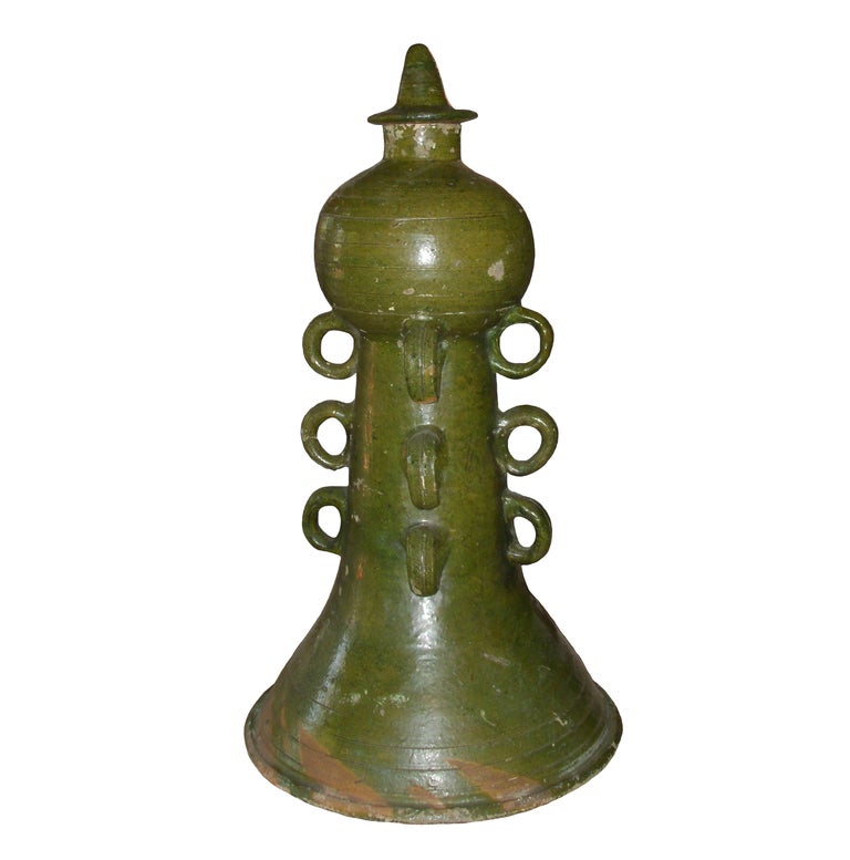 Decorative green glazed French Chimney Ornament with a series of twelve rings and a finial element at the tip. Incredible scale, sculptural shape.