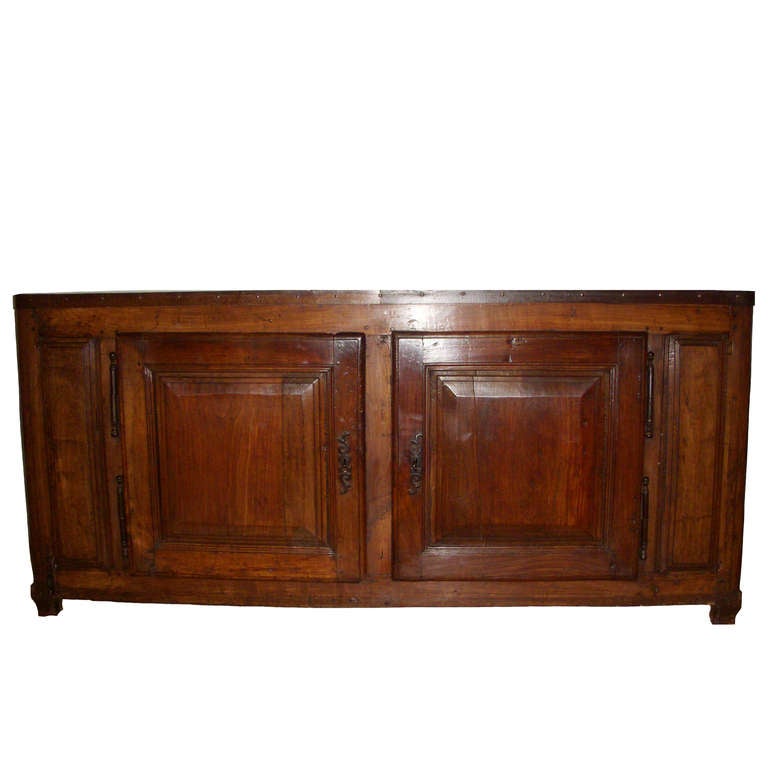18th Century French Cherry Wood Buffet with two doors; iron banded border; framed inset panels; fabulous patina.