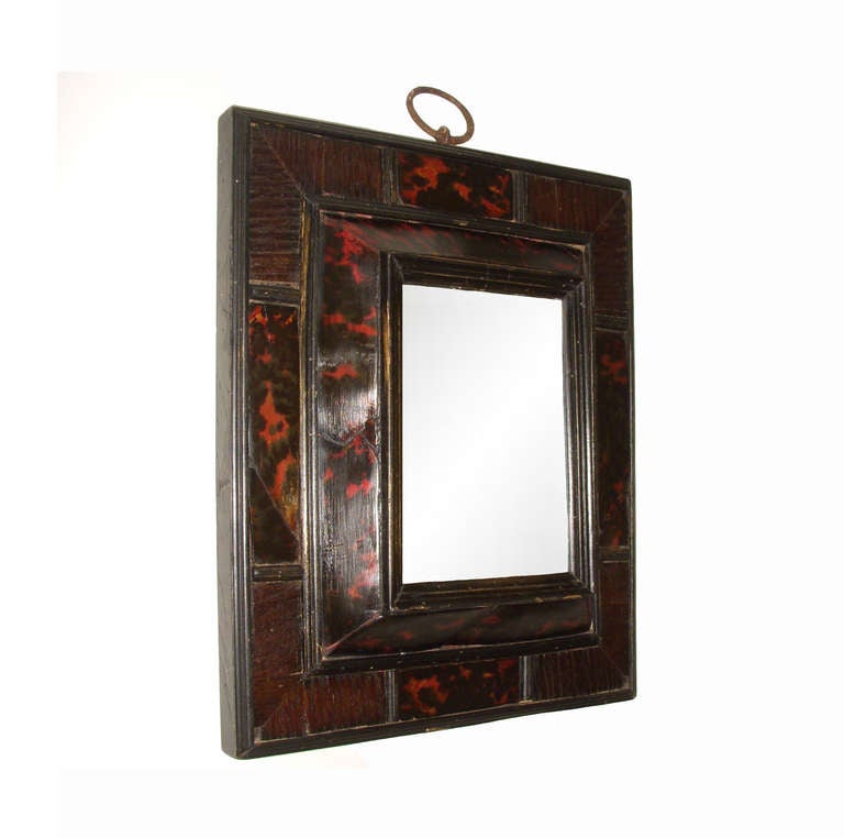 Original 17th century, French tortoiseshell mirror; series of projected moldings; rich calibration of color.