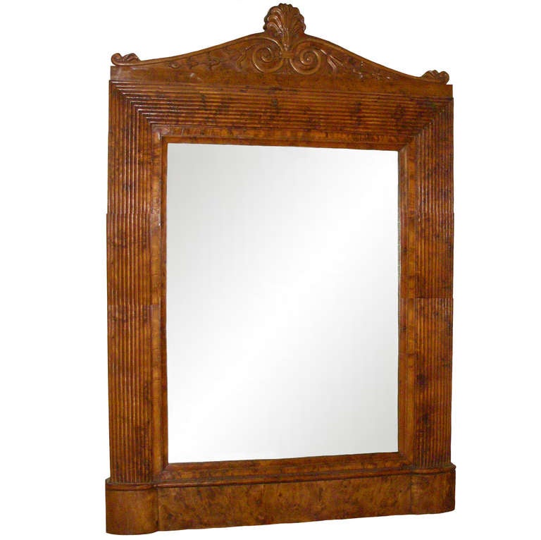 Heroic Italian Burl Mahogany framed mirror; classically fluted columns with applied molded finial; vines.  Beautiful patina.  A fabulous piece for a gentleman's dressing room.
