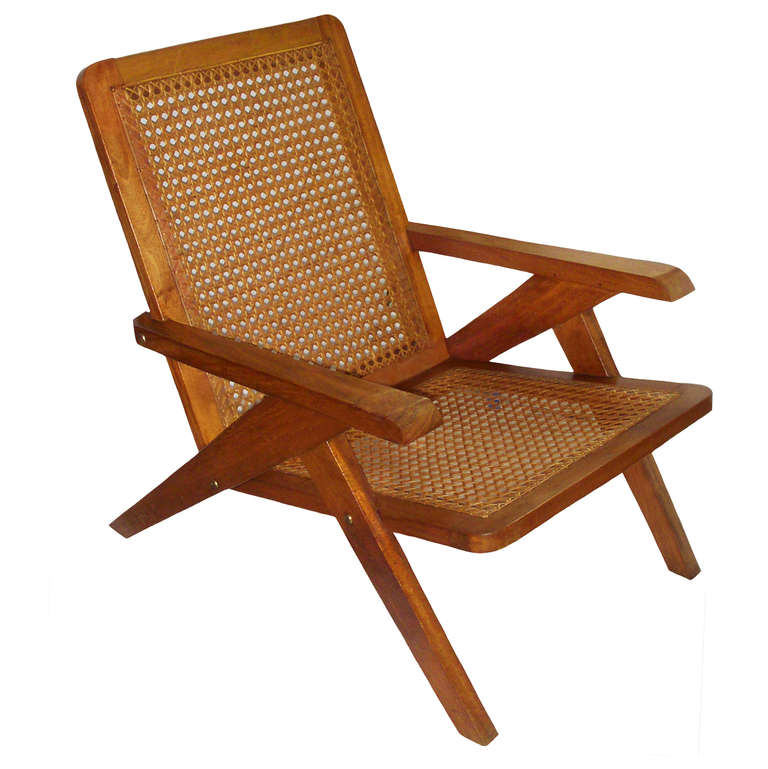 Pair of Mid-Century Modern French Teak Cane Arm Chairs by Pierre Jeanneret; circa  1950.