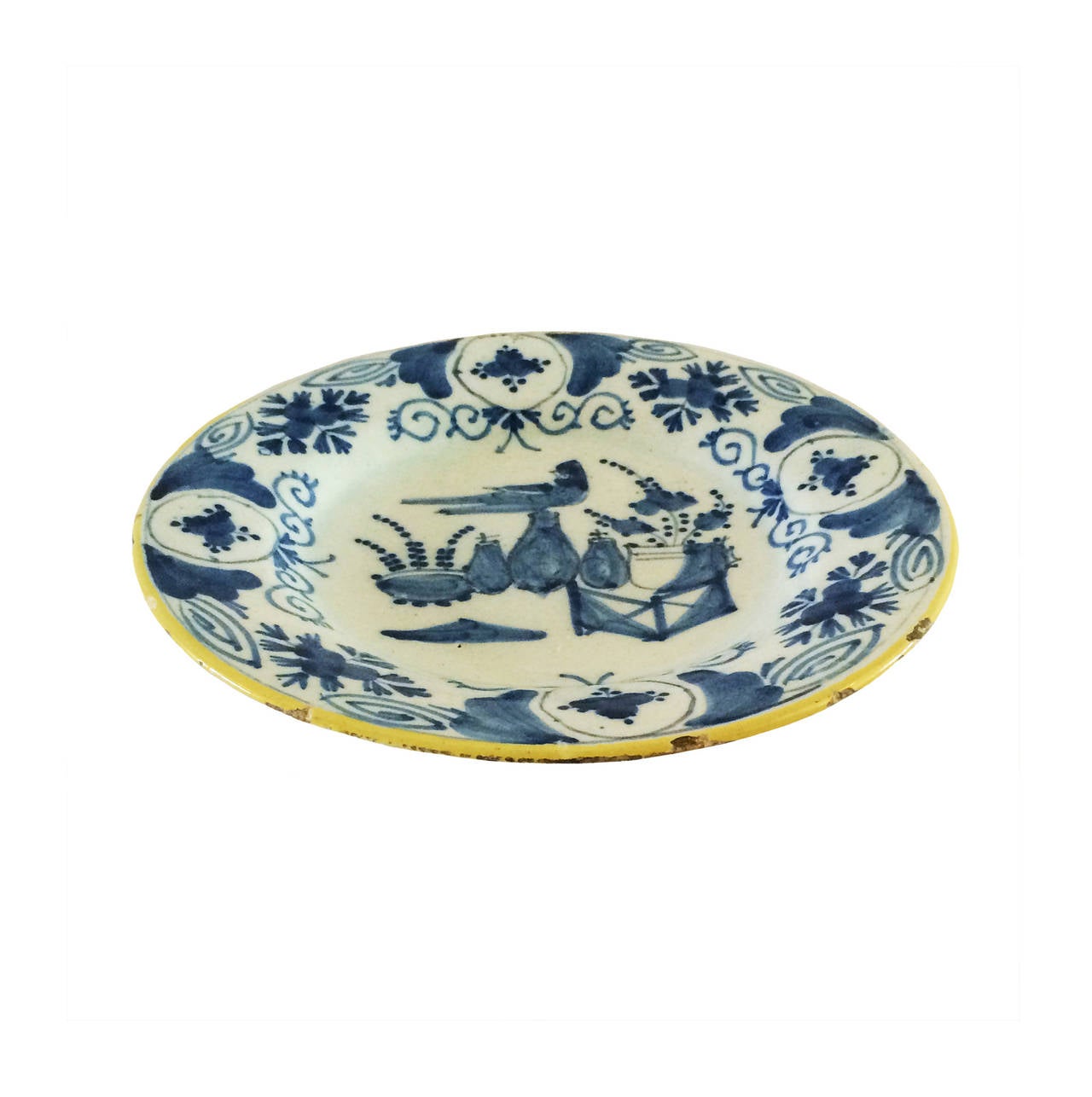 18th Century Blue & White Delft Plate; floral theme with a perched bird; yellow border; Netherlands.