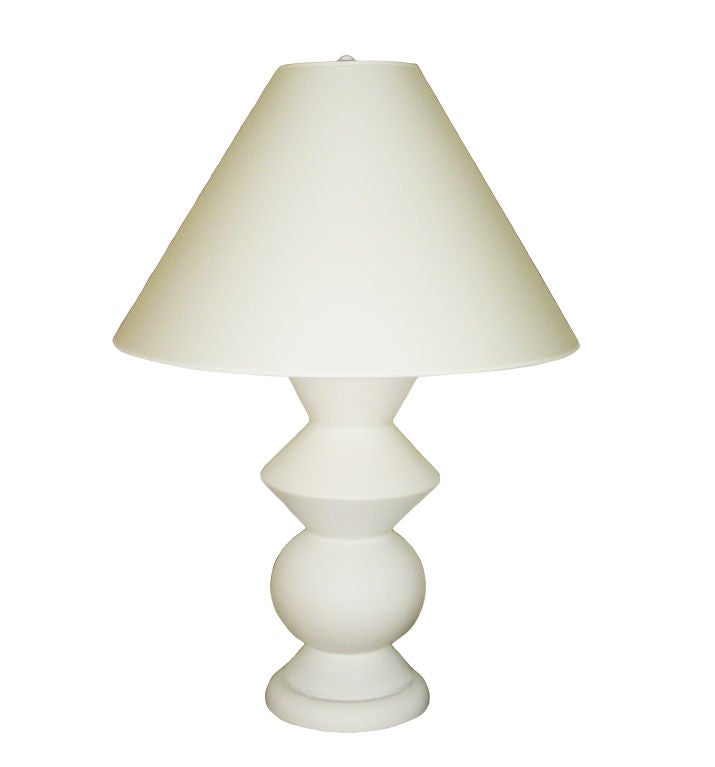 A pair of modern custom white Scandanavian pottery lamps.  Brancusi inspired; fabulous contemporary sculpture.  Priced individually.